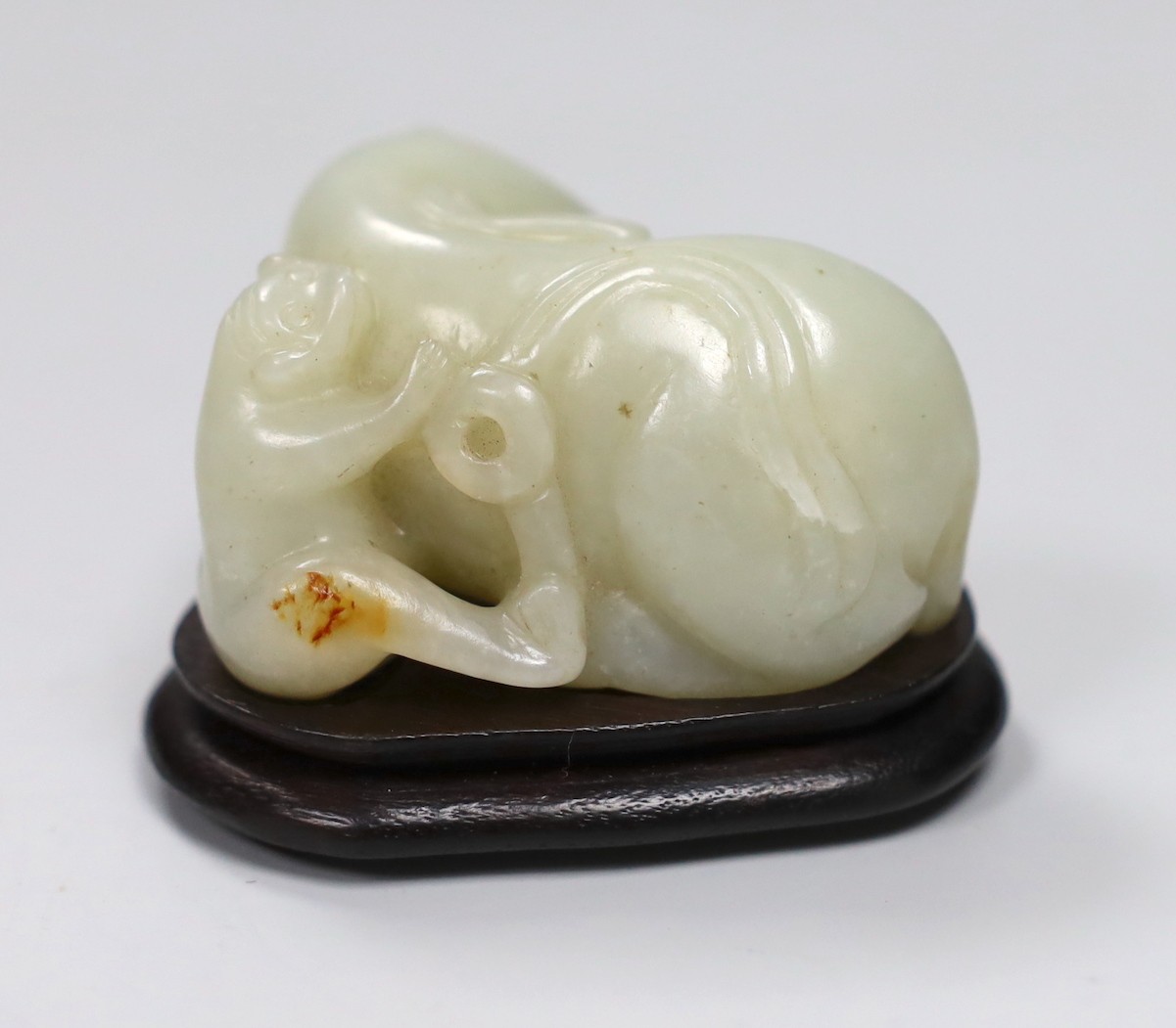 Chinese white jade carving of a monkey and elephant, with wooden stand - 8cms wide and a Chinese bronze figure